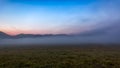 Morning fog at Piano Grande, Castelluccio, Umbria, Italy Royalty Free Stock Photo