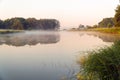 Morning fog on a quiet lake Royalty Free Stock Photo