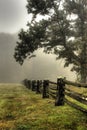 Morning fog on split rail fence Royalty Free Stock Photo