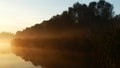 Morning fog at sunrise over pond in Katowice. Poland. Royalty Free Stock Photo