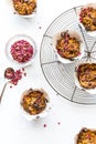 Morning Glory muffins on a vintage cooling rack, garnished with rose petals. Royalty Free Stock Photo