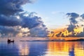 Morning golden sunrise on blue sea, ship silhouette and clouds scenic landscape, scenery ocean bright colorful sunset, Thailand