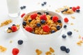 Morning healthy Breakfast honey Cornflakes with fresh fruits of Raspberry, blueberries Royalty Free Stock Photo
