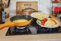 Morning healthy breakfast of scrambled eggs with parmesan cheese, cucumbers, cherry tomatoes and sweet peppers is fried Royalty Free Stock Photo