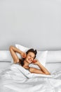 Morning. Healthy Woman After Wake Up Relaxing In Bed. Wellness Royalty Free Stock Photo