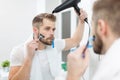 Morning hygiene, Man in the bathroom and his morning routine Royalty Free Stock Photo