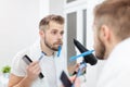 Morning hygiene, Man in the bathroom and his morning routine Royalty Free Stock Photo