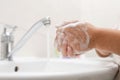 Washing hands in the bathroom Royalty Free Stock Photo