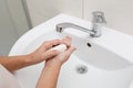 Washing hands in the bathroom Royalty Free Stock Photo