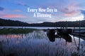 Morning inspiraitonal quote - Every New Day is A Blessing. With blue sunrise over lake with wooden fishing boats at sunrise.