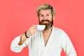 Morning inspiration. bearded man in bathrobe with cup. hipster start day. early awakening with cup of espresso. good