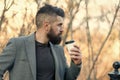 Morning inspiration. Thoughtful man drink take away coffee. Coffee aesthetics. Mature hipster with beard with coffee cup