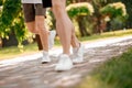 Male legs running along the park path Royalty Free Stock Photo