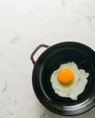 Morning in the kitchen. Cooking breakfast. Fried egg. Royalty Free Stock Photo