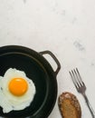 Morning in the kitchen. Cooking breakfast. Fried egg. Royalty Free Stock Photo