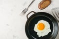 Morning in the kitchen. Cooking breakfast. Fried egg. Royalty Free Stock Photo