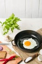Morning in the kitchen. Cooking breakfast. Fried egg. Royalty Free Stock Photo