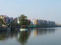 Morning lake side view with colorful graffiti building