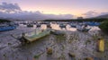 Morning landscape with stranded boats on Tamsui river during a low tide Royalty Free Stock Photo