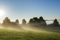 Morning landscape view across foggy meadow in Poland Royalty Free Stock Photo