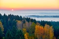 Morning landspace with sun rays. Beautiful landscape with forest and fog.Lithuanian landscape Royalty Free Stock Photo