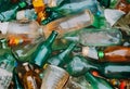 Pile of colorful glass and plastic bottles for recycling.AI Generated Royalty Free Stock Photo