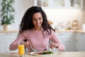 Morning Meal. Smiling Young Woman Eating Tasty Breakfast In Kitchen Royalty Free Stock Photo