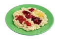 Morning millet porridge on a green plate with jam on breakfast isolated Royalty Free Stock Photo