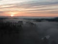 Morning Mist: Aerial View of Enchanting Forest Landscape at Sunrise Royalty Free Stock Photo