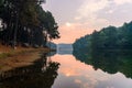 Morning mist on a calm tropical mountain lake in Pang Ung , Mae Hong Son province,Thailand Royalty Free Stock Photo