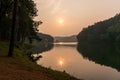 Morning mist on a calm tropical mountain lake in Pang Ung , Mae Hong Son province,Thailand Royalty Free Stock Photo