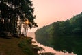 Morning mist on a calm tropical mountain lake in Pang Ung , Mae Hong Son province,Thailand Royalty Free Stock Photo