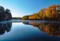 Morning mist and fall colors at Rocky Gorge Reservoir in Howard County, Maryland