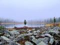 Morning mist on a mountain lake. Royalty Free Stock Photo
