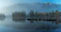 Morning mist on the river Zhombolok Royalty Free Stock Photo