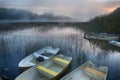 Rowboats in morning mist Royalty Free Stock Photo