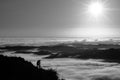 Landscape Photographer taking pictures of sunrise and morning fog atTe Mata Peak, Hawke`s Bay, New Zealand Royalty Free Stock Photo