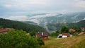 Morning mists over the mountain peaks and small villages