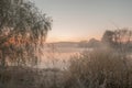 Morning on misty foggy Autumn lake