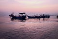 Morning mood with the sunrise at penang Malaysia where there is a boats near the beach Royalty Free Stock Photo