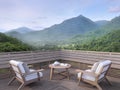 Morning mountain view on a wooden balcony 3d render Royalty Free Stock Photo