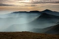 Morning mountain with waves of fog