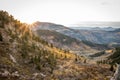 Sun Peaking over Horizon in the Morning on the Mountains Royalty Free Stock Photo