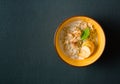 Morning oatmeal for breakfast. Early morning and healthy diet food. Proper nutrition. Dark stone background. Plenty of Royalty Free Stock Photo