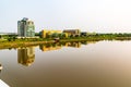 Morning in Omaha. Sunrise reflections in Missouri River by Gallup University and Riverfront condominiums. Royalty Free Stock Photo