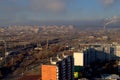 Morning panorama of the city overlooking the railroad tracks and the overpass under construction. Royalty Free Stock Photo