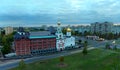Morning panorama of the city overlooking the Volga Orthodox Institute and the Church of the Three Saints on Yubileinaya Street.
