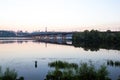 Morning panorama of Dnipro river with Paton Bridge. Cityscape view of famous Kyiv`s hills, Motherland Monument on horizon Royalty Free Stock Photo