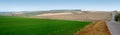panoramic view of beautiful agicultural fields and dirt road in autumn Royalty Free Stock Photo