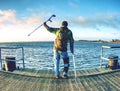 Morning passanger on ferry pier in dock wait for ferry boat Royalty Free Stock Photo